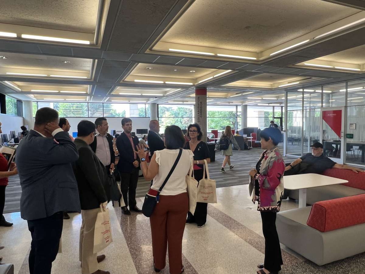 Dean Hilary Seo gives a tour of Parks Library to a delegation from NURIMAT, the Center of International Relations for the state of Mato Grosso, Brazil